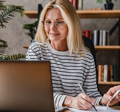 woman setting a savings plan