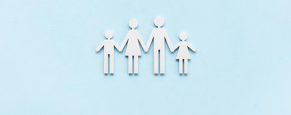 Wooden family figure. Health care, family medicine, medical and social insurance concept Wooden family figure. Health care, family medicine, medical and social insurance concept