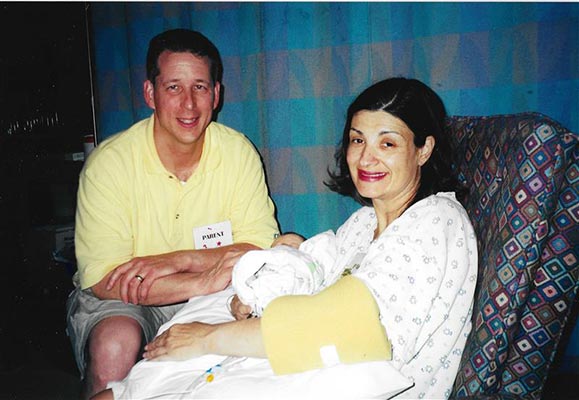 Zoe Corrigan-with-mom-dad