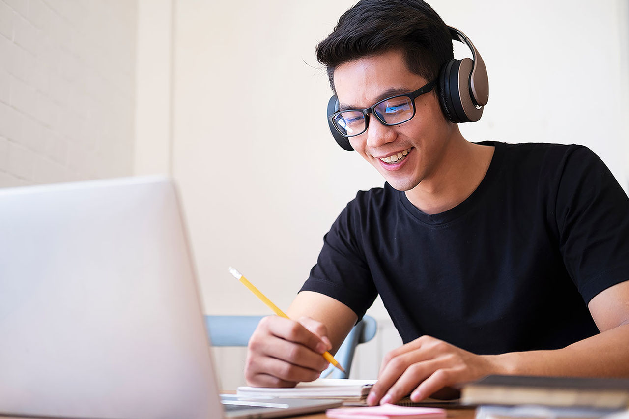 Young man learning financial tips.